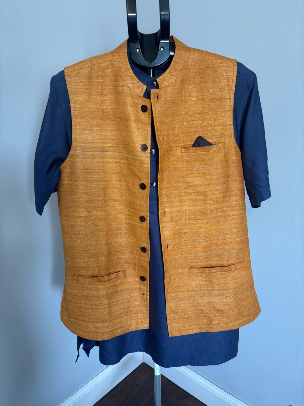 fabindia Orange-Brown Nehru Jacket Over Navy Shirt